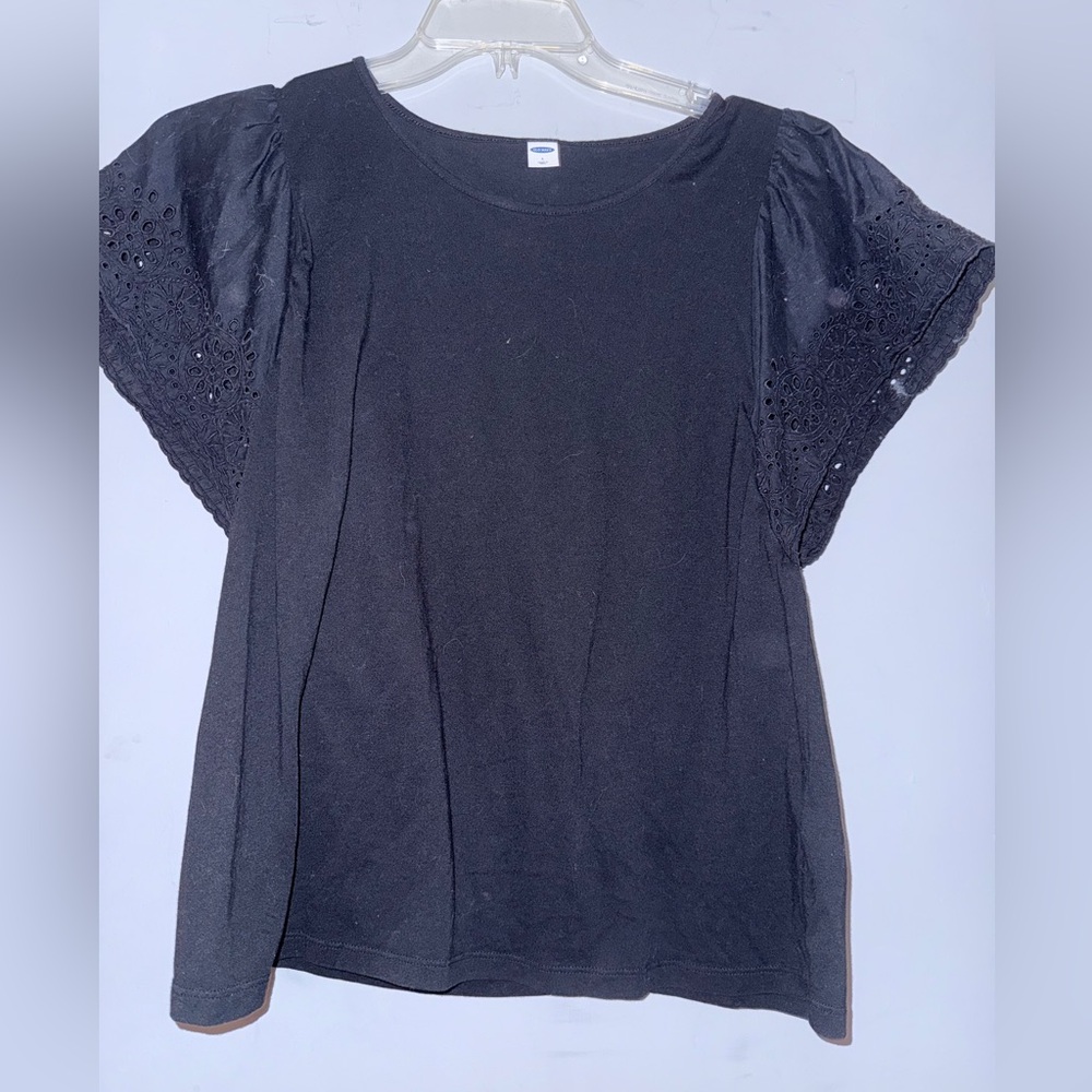 Women’s black shirt with eyelet sleeves